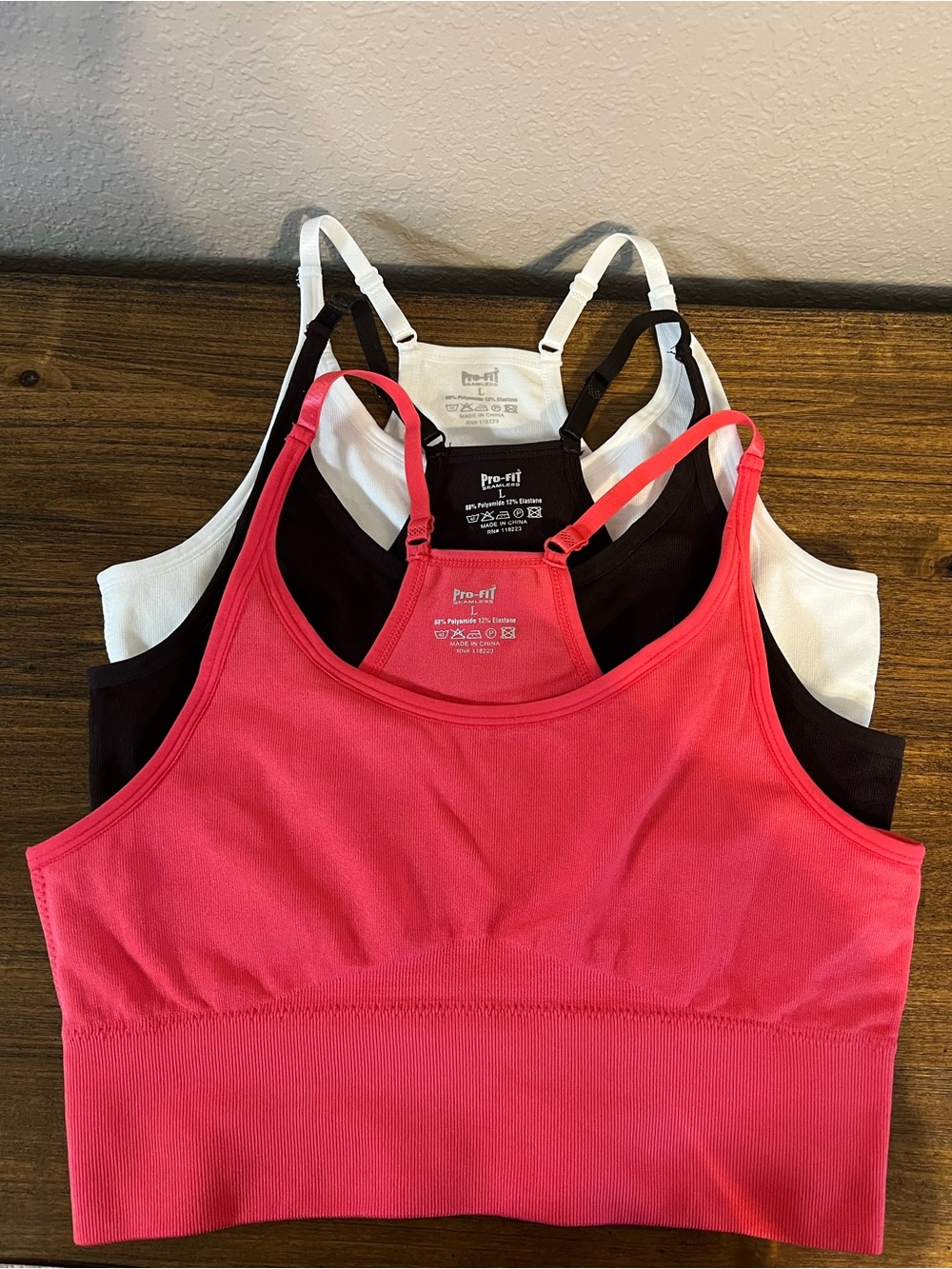 NWOT Pro-Fit seamless sports bra bundle size L Coral pink Chocolate brown White